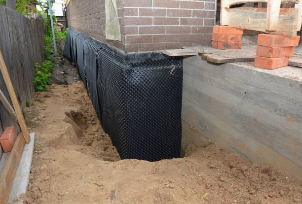 SJ Waterproofing Pros technician performing targeted Emergency Waterproofing assessment in Atlanta, IL